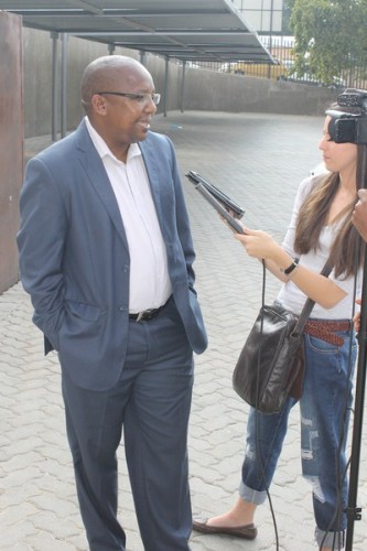 Muzi Ntuli speaking to the media.