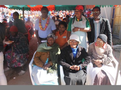 Close members of the Xhoma family with Mme Xhoma front left who accommodated Mandela when he first came to Joburg and Cedric Chauke of Tshebelisano support centre (back row right in glasses).
