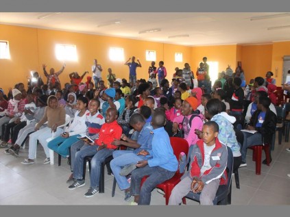 Children in the Rays of Hope organisation's Rose Act project applaud motivational talks and demonstrations by Children of Fire on the dangers of uncontrolled fires.