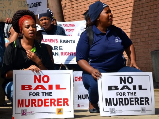 Protest against the bail application for a rape accused at the Alexandra Magistrates' Court.