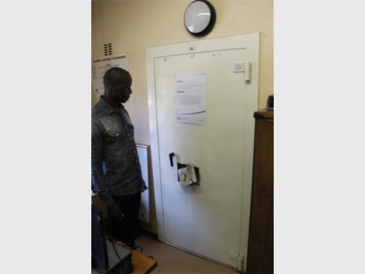 KwaBhekilanga Secondary School deputy principal Sehlano Makwela next to the strong room that was broken into.
