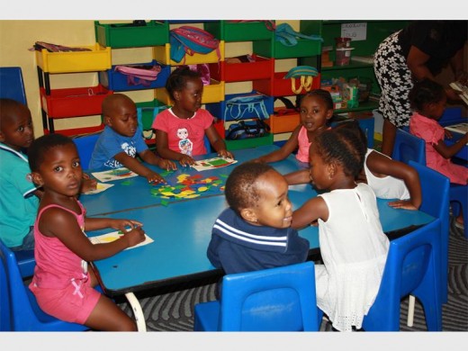 Children have fun with their toys at Boitumelong Early Learning Centre.