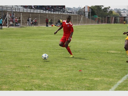 Gauteng FC's Ramotsepa Nthite, who was a thorn in the flesh of Soweto Panthers defenders, races off with the ball towards the goals.